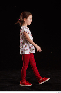Lilly  1 dressed red leggings red shoes side view…